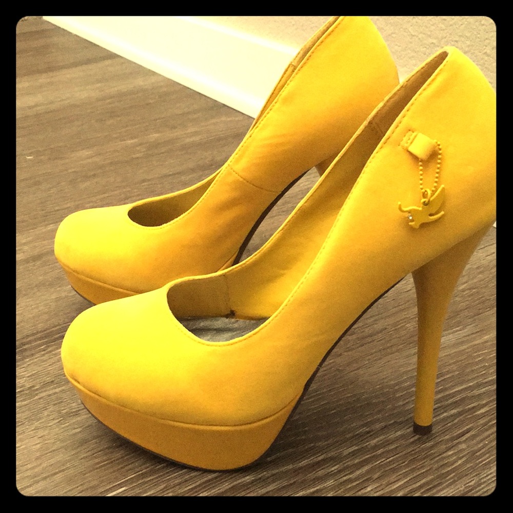Yellow suede platform heels